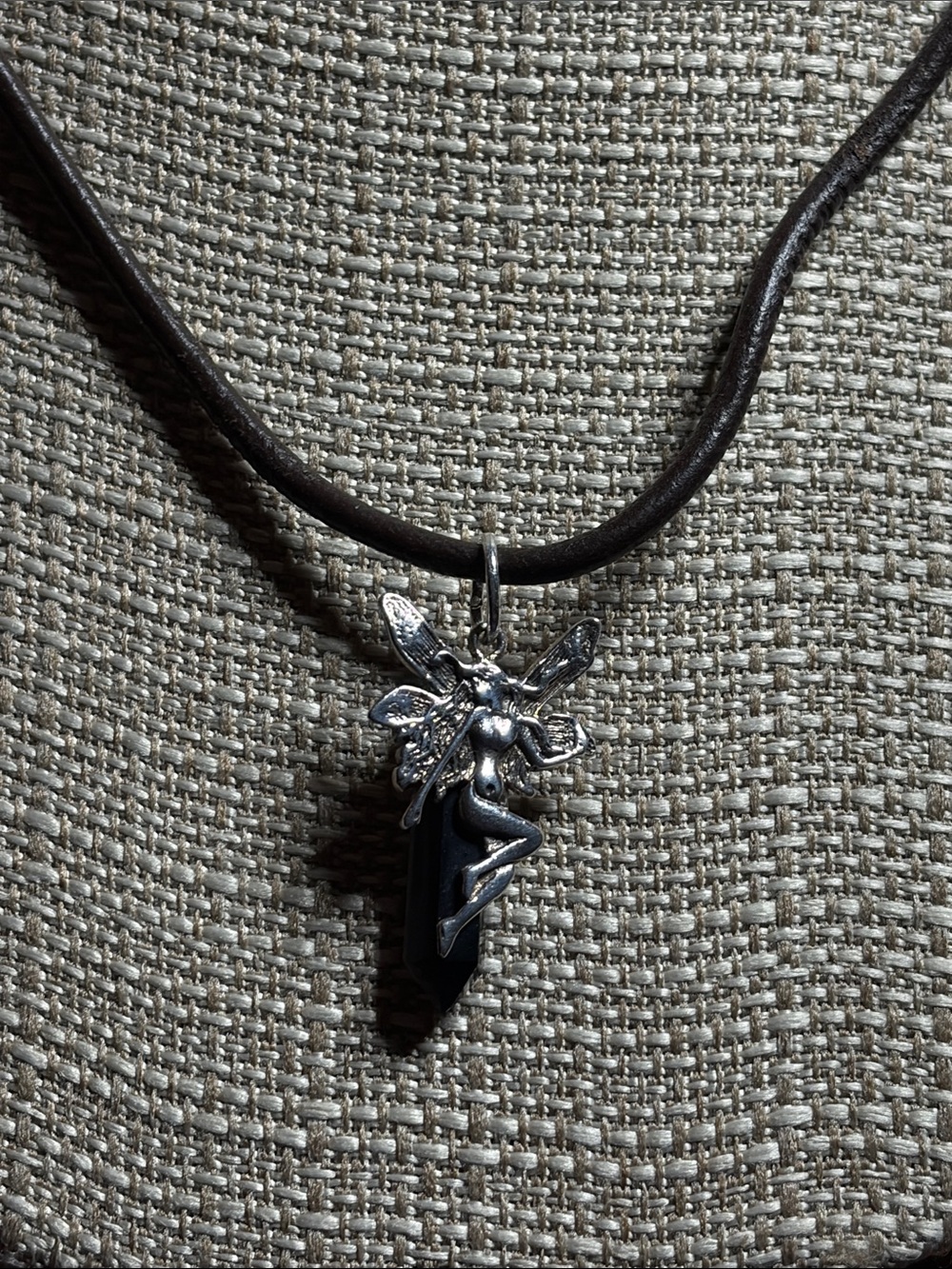 Fairy an a obsidian crystal on 19” leather chord with clasp. Vintage 90s
